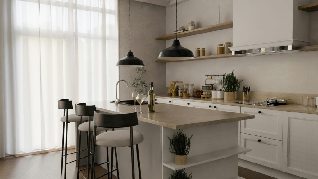 Elegant modern kitchen with white cabinets and minimalist decor.